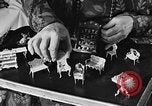 Image of Mother Katherine Larke miniature doll house San Francisco California USA, 1930, second 28 stock footage video 65675054984