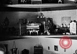 Image of Mother Katherine Larke miniature doll house San Francisco California USA, 1930, second 39 stock footage video 65675054984