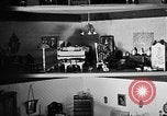 Image of Mother Katherine Larke miniature doll house San Francisco California USA, 1930, second 40 stock footage video 65675054984