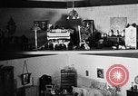 Image of Mother Katherine Larke miniature doll house San Francisco California USA, 1930, second 42 stock footage video 65675054984