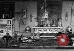 Image of Mother Katherine Larke miniature doll house San Francisco California USA, 1930, second 49 stock footage video 65675054984