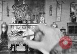 Image of Mother Katherine Larke miniature doll house San Francisco California USA, 1930, second 58 stock footage video 65675054984