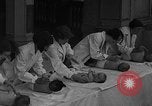 Image of mothers and babies New York City USA, 1931, second 29 stock footage video 65675054990