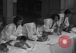 Image of mothers and babies New York City USA, 1931, second 46 stock footage video 65675054990