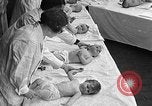 Image of mothers and babies New York City USA, 1931, second 51 stock footage video 65675054990