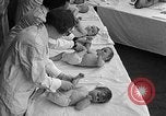Image of mothers and babies New York City USA, 1931, second 53 stock footage video 65675054990
