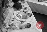 Image of mothers and babies New York City USA, 1931, second 54 stock footage video 65675054990