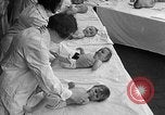 Image of mothers and babies New York City USA, 1931, second 55 stock footage video 65675054990