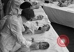 Image of mothers and babies New York City USA, 1931, second 56 stock footage video 65675054990