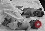 Image of mothers and babies New York City USA, 1931, second 57 stock footage video 65675054990