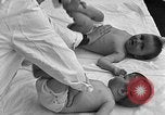 Image of mothers and babies New York City USA, 1931, second 58 stock footage video 65675054990