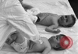 Image of mothers and babies New York City USA, 1931, second 60 stock footage video 65675054990
