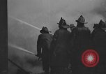 Immagine di Aurora vigili del fuoco combattono Woolworth Building fire Aurora Illinois USA, 1934, secondo 13 filmato di repertorio 65675055015