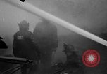Immagine di Aurora vigili del fuoco combattono Woolworth Building fire Aurora Illinois USA, 1934, secondo 15 filmato di repertorio 65675055015