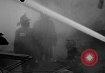 Immagine di Aurora vigili del fuoco combattono Woolworth Building fire Aurora Illinois USA, 1934, secondo 16 filmato di repertorio 65675055015