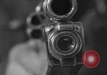 Immagine di Combinazione di revolver movie camera United States USA, 1935, secondo 5 filmato di repertorio 65675055177