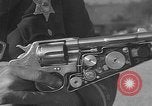 Immagine di Combinazione di revolver movie camera United States USA, 1935, secondo 7 filmato di repertorio 65675055177