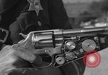 Immagine di Combinazione di revolver movie camera United States USA, 1935, secondo 9 filmato di repertorio 65675055177
