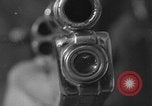 Immagine di Combinazione di revolver movie camera United States USA, 1935, secondo 12 filmato di repertorio 65675055177