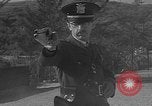 Immagine di Combinazione di revolver movie camera United States USA, 1935, secondo 13 filmato di repertorio 65675055177