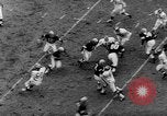 Standbild pro Fußballspiel 1960 Eagles gegen Browns Cleveland Ohio USA, 1960, aus Sekunde 32 historischem Filmmaterial Videoclip 65675055184