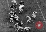 Standbild pro Fußballspiel 1960 Eagles gegen Browns Cleveland Ohio USA, 1960, aus Sekunde 49 historischem Filmmaterial Videoclip 65675055184