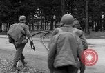 Image of American troops at outskirts of Dachau Concentration Camp Dachau Germany, 1945, second 19 stock footage video 65675055237