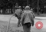 Image of American troops at outskirts of Dachau Concentration Camp Dachau Germany, 1945, second 20 stock footage video 65675055237