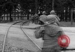 Image of American troops at outskirts of Dachau Concentration Camp Dachau Germany, 1945, second 22 stock footage video 65675055237