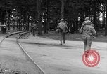 Image of American troops at outskirts of Dachau Concentration Camp Dachau Germany, 1945, second 25 stock footage video 65675055237