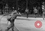 Image of American troops at outskirts of Dachau Concentration Camp Dachau Germany, 1945, second 26 stock footage video 65675055237