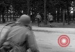 Image of American troops at outskirts of Dachau Concentration Camp Dachau Germany, 1945, second 28 stock footage video 65675055237