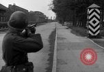 Image of American troops at outskirts of Dachau Concentration Camp Dachau Germany, 1945, second 49 stock footage video 65675055237