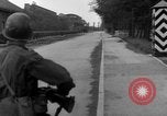 Image of American troops at outskirts of Dachau Concentration Camp Dachau Germany, 1945, second 50 stock footage video 65675055237