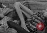 Image of dead bodies Dachau Germany, 1945, second 47 stock footage video 65675055238