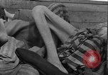 Image of dead bodies Dachau Germany, 1945, second 48 stock footage video 65675055238