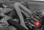 Image of dead bodies Dachau Germany, 1945, second 49 stock footage video 65675055238
