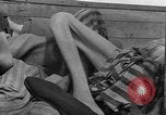 Image of dead bodies Dachau Germany, 1945, second 52 stock footage video 65675055238
