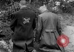 Image of dead bodies at Dachau Dachau Germany, 1945, second 7 stock footage video 65675055239