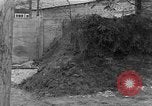 Image of dead bodies at Dachau Dachau Germany, 1945, second 11 stock footage video 65675055239