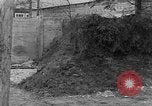 Image of dead bodies at Dachau Dachau Germany, 1945, second 12 stock footage video 65675055239