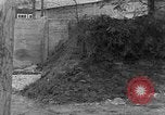 Image of dead bodies at Dachau Dachau Germany, 1945, second 13 stock footage video 65675055239