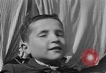 Image of lineup of perpetrators at Dachau concentration camp Dachau Germany, 1945, second 50 stock footage video 65675055244