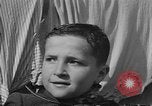 Image of lineup of perpetrators at Dachau concentration camp Dachau Germany, 1945, second 52 stock footage video 65675055244