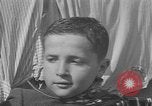 Image of lineup of perpetrators at Dachau concentration camp Dachau Germany, 1945, second 57 stock footage video 65675055244