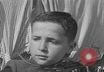 Image of lineup of perpetrators at Dachau concentration camp Dachau Germany, 1945, second 60 stock footage video 65675055244