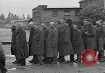 Image of lineup of perpetrators at Dachau concentration camp Dachau Germany, 1945, second 62 stock footage video 65675055244