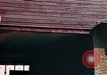 Standbild Konzentrationslager Buchenwald gate Ettersberg Deutschland, 1945, aus Sekunde 58 historischem Filmmaterial Videoclip 65675055279
