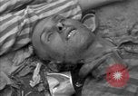 Immagine di Morti e malati prigionieri politici Baviera Germania, 1945, secondo 25 filmato di repertorio 65675055299