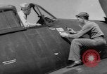 Image of Japanese flag painted on aircraft to record aerial victory Pacific Ocean, 1945, second 1 stock footage video 65675055307